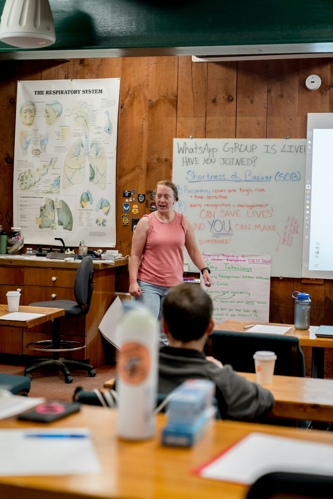 older woman teaching class